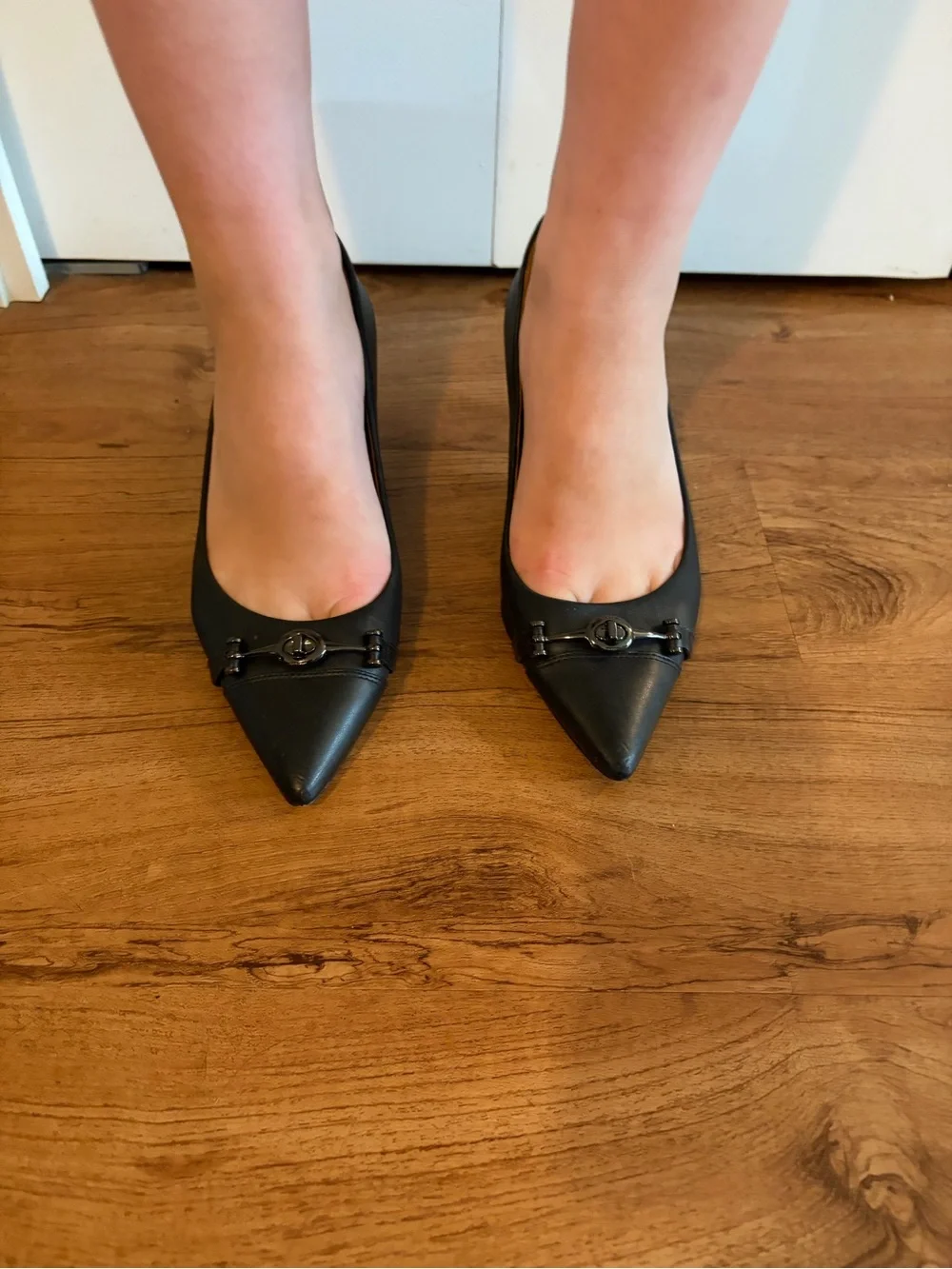 Coach Black Pointed-Toe Flats with Signature Metal Accent